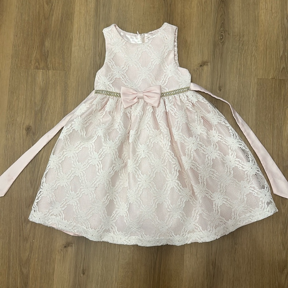 Light pink, formal dress with lace overlay and sparkly band. Size 4t